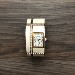 Cream/gold watch, from Vivah